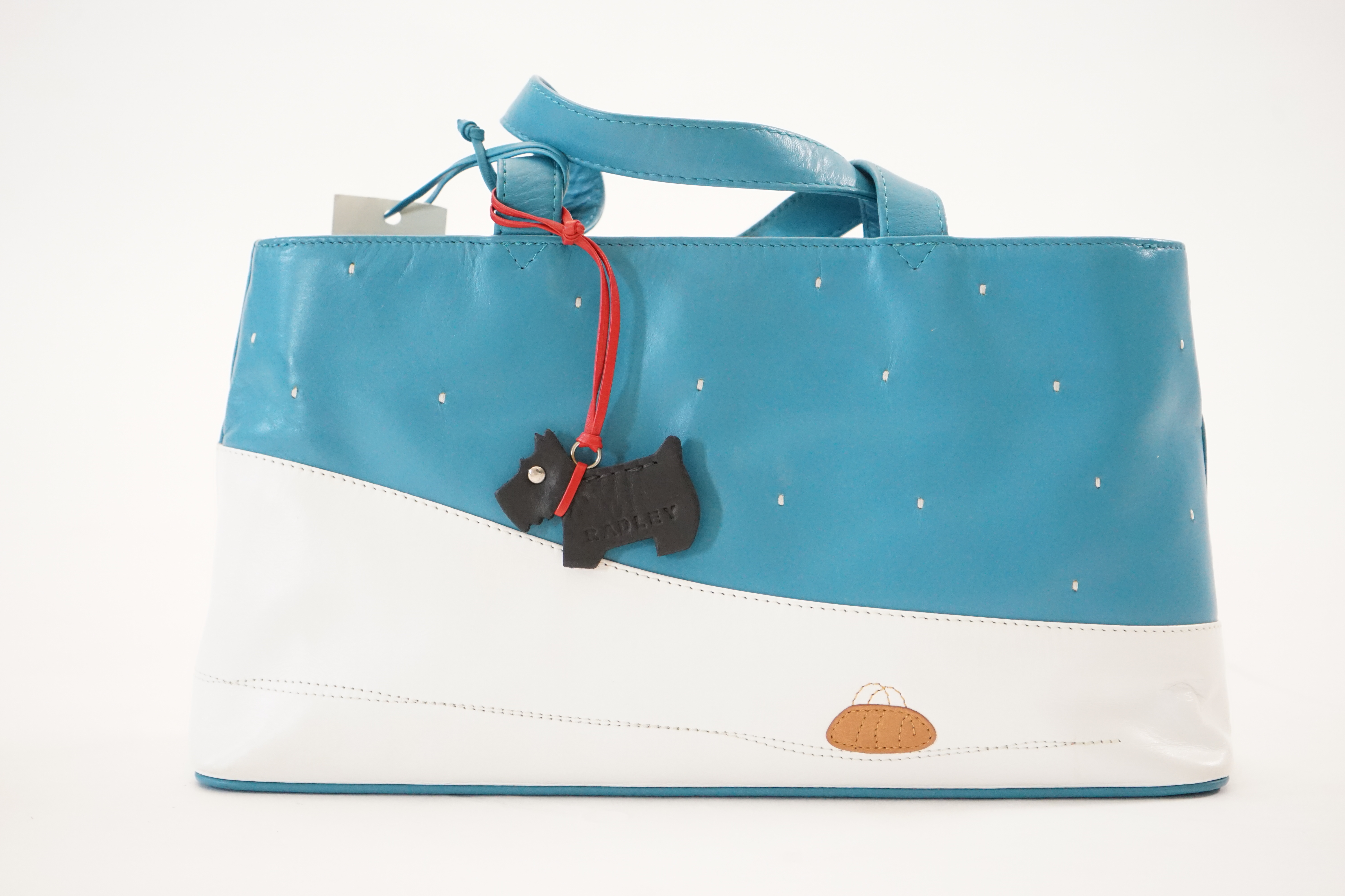 A Radley blue and white 'Explorer' leather grab handle bag 2004, width 30cm, depth 8.5cm, height 16cm